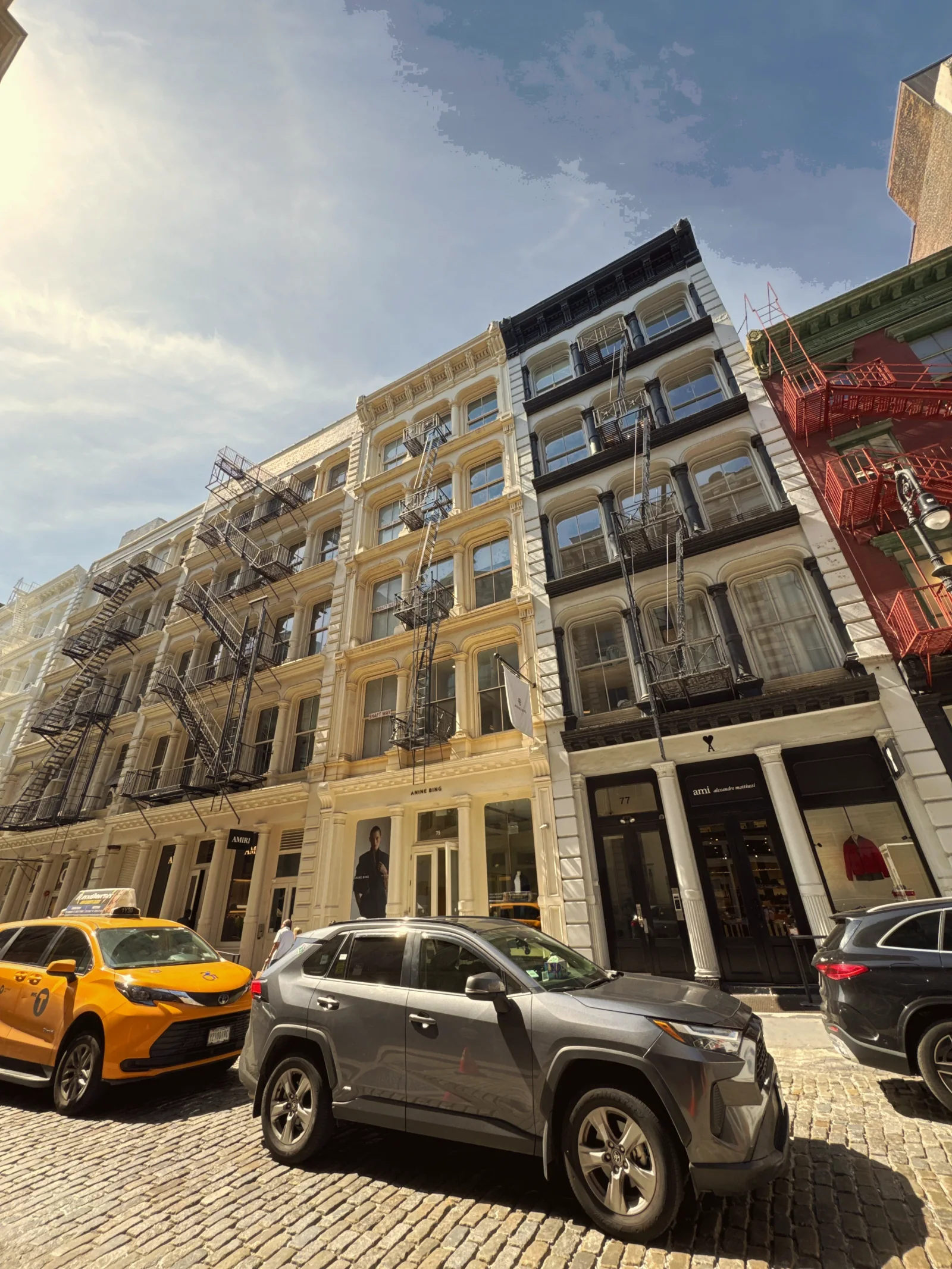 Cast-iron building facades beneath the sky in SoHo, Manhattan.